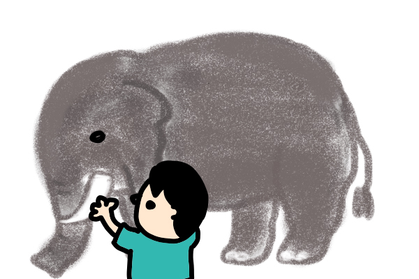 象の牙を触る盲人