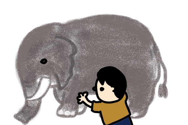 象の足に触れる盲人